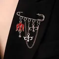 Kazakh ethnic style silver safety pin brooch with red enamel and chain details. - Kazakh Totem Tassel Style (2409) / Silver Red