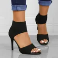 Stylish black fly-knit peep-toe sandals featuring thin high heels and ankle strap. - US5 / Black