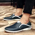 Stylish hand-stitched navy blue men's leather loafers featuring breathable slip-on design - 38 / Blue
