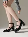 Detailed side view of black patent Mary Jane pumps with square toe and chunky heel - 36 / Black
