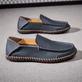 Comfortable men's navy blue first layer cowhide loafers with textured finish and stitched sole - 38 / Blue