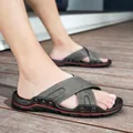 Herren-Sandalen aus grauem Echtleder mit Kreuzriemen-Design und robuster Gummisohle - 38 / Grau