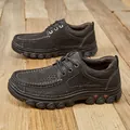 Atmungsaktive dunkelgraue Herren-Freizeitschuhe aus erstklassigem Rindsleder in Grau - 38 / Schwarz