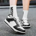 Classic black and white casual board shoes with stylish lace-up design for daily wear - 35 / Black and White