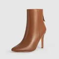 Sophisticated brown pointed toe stiletto ankle boots with premium matte leather texture - US7 / Brown