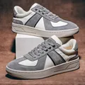 Graue und weiße German Army Trainer Sneaker für Herren aus Schweinsleder, Variante. - 38 / Grau