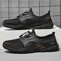 Atmungsaktive schwarze Mesh-Sportschuhe für Herren mit roten Akzenten und weicher Sohle - 38 / Schwarz