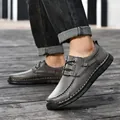 Graue Herren-Freizeitschuhe aus weichem Leder mit Handnaht und klassischem Schnürdesign - 38 / Grau