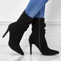 Elegant black suede pointed toe high heel ankle boots featuring a stylish slouchy design - US7 / Black