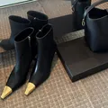 Elegant black ankle boots with pointed gold metal toe caps and thin high heels for women. - 38 / Stiletto Style / 7cm Heel Height / Black
