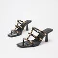 Elegant black patent square-toe mule sandals with gold metal studs and stiletto heels - 35 / Black Mirror