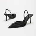 Elegant black lace slingback stiletto heels with pointed toe and chic floral details. - 38 / Black Rose Net