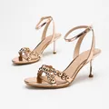 Elegant gold stiletto sandals featuring metallic bead detailing and ankle straps - 38 / Champagne Mirror