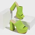Close-up of vibrant lime green knitted platform sandals with chunky heels and square toe. - 35 / Green