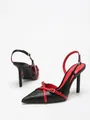 Detail view of black and red color-blocking pointed-toe stiletto slingback high heels - 38 / Black Red PU