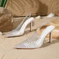 Elegant pointed toe slingback sandals with rhinestones and stiletto heels in beach setting - 35 / Off-White Satin