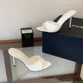 Elegant white patent leather stiletto high heel mules with a minimalist 9cm heel - 35 / White