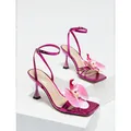 Elegant pink snake print stiletto sandals with 3D floral accent and ankle straps - 35 / Purple Pink