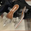 Elegant pointed-toe mules featuring sparkling rhinestone bows and clear crystal block heels. - 35 / Silver Crystal Block Heel (4CM)