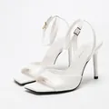 Elegant white square-toe stiletto sandals with thin ankle straps and PU finish. - 38 / White