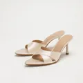 Elegant champagne satin pointed-toe mules with cross straps and slim high heels for women. - 35 / Apricot