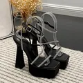 Elegant black platform sandals with chunky high heels and sparkly rhinestone straps - 35 / Black