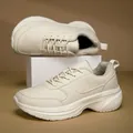 Macro view of cream wide-toe winter sneakers with warm fleece lining detail - 36 / White