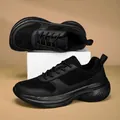 Side view of black wide-toe winter sneakers with thick rubber soles and plush lining - 36 / Black