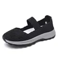 Scarpa slip-on nera intrecciata elastica traspirante per donna con spessa suola grigia. - 35 / tutto nero