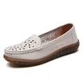 Elegant beige leather loafers for women featuring breathable floral laser-cut details. - 35 / Gray