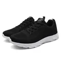 Men's black fly-knit breathable running shoes with a lightweight white rubber sole - 39 / Black and White