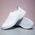 Comfortable breathable white flyknit slip-on walking shoe for women with textured rubber sole - 35 / White