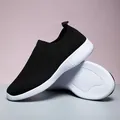 Lightweight and breathable black fly-knit slip-on walking sneakers with thick white sole - 35 / Black