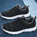 Men's breathable fly-knit casual sneakers with lightweight white sole in black - Black and Gray