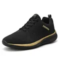 Lightweight breathable black running shoes for men and women with gold accents - 38 / Black & Gold