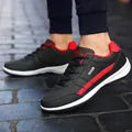 Casual αδιάβροχα μαύρα δερμάτινα sneakers με κόκκινες ρίγες για ανδρική καθημερινή μόδα - 38 / Μαύρο