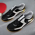 Breathable children's table tennis shoes with rotating buckle closure in black and white - 30 / Black