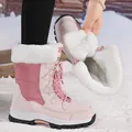 Pink women's snow boots with white faux fur lining and lace-up design for winter. - 36 / Pink
