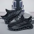 Men's black shock-absorbing running shoes featuring striped mesh and hollow blade soles. - 39 / Black