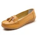 Gelbe Leder-Loafer für Damen mit Quasten und einer weichen Keilsohle aus Gummi. - 35 / Gelb