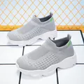 Grey fly-knit breathable sock sneakers with soft white cushioned soles for kids and women - 29 / Gray