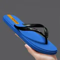 Einfache blaue Strand-Flip-Flops für Herren und Damen mit schwarzen Riemen und rutschfester Sohle - 39 / Saphirblau