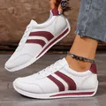 Close-up of white casual sneakers with burgundy stripe details and a lace-up design - 35 / White Red 315