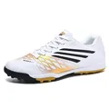 Professional white and gold turf soccer shoes with low-top design for youth athletes - 30 / White