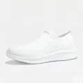 Detailweergave van witte ademende gebreide instapsneakers voor zowel dames als heren - Wit