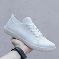 Breathable white fly-knit casual sneaker with a wide-toe barefoot design style - White