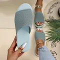 Detailed view of light blue knitted flat slide sandals for women's summer beach wear - Gray
