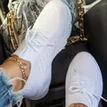 Detailed view of white breathable fly-knit sneakers for women with lace-up design - 35 / Dad Shoes / White