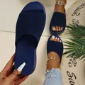 Detailed view of navy blue knit thick-sole sandals on a stylish summer resort mat - 35 / Dark Blue