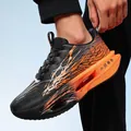 Lightweight kids carbon plate running shoe in black and orange with shock absorption sole - 34 / Black Wukong (Black & Orange)